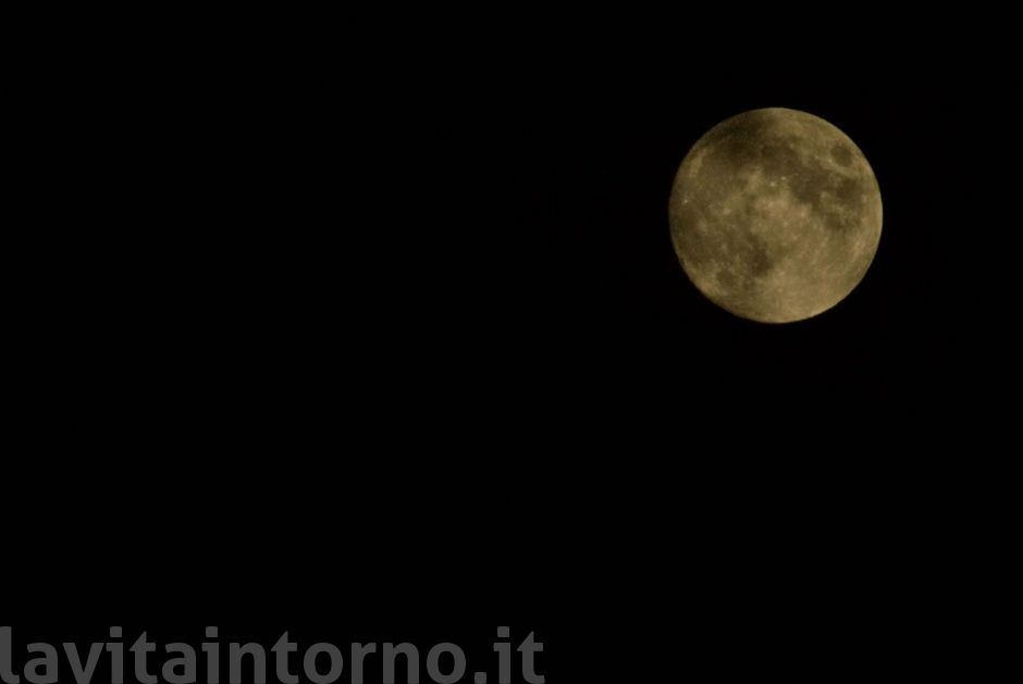 eclipse waiting in cloudy sky